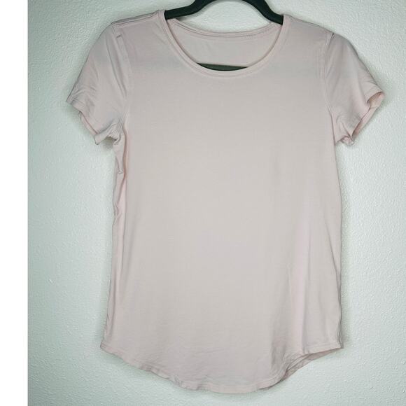 Lululemon Pale Pink Short Sleeve Round Neck Curved Hem Tee Shirt 6 - Picture 1 of 8